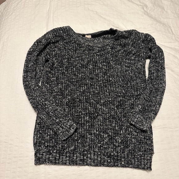 Sweater with a pocket on the left side. - Picture 1 of 1
